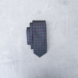 Lovewell Classic silk tie designed by Niki Fulton. Deep green & purple print.