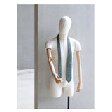 Fennel Tangle Tie designed by Niki Fulton. A green floral print. Seen here on a mannequin