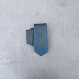 Lovewell Khaki silk tie designed by Niki Fulton. A teal & khaki print.