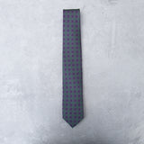 Lovewell Classic silk tie designed by Niki Fulton. Deep green & purple print.