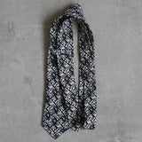 Eden linen tie designed by Niki Fulton. A black & white abstract print. 