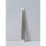 Freedom silk tie designed by Niki Fulton. A bronze & blue graphical print